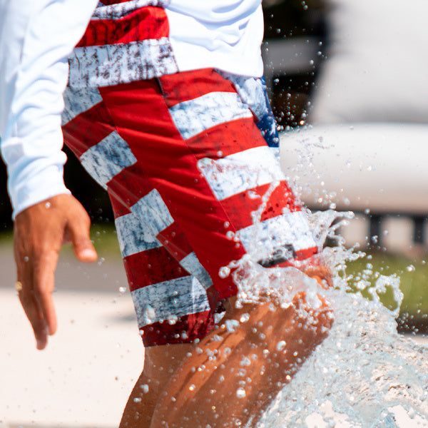 PERFORMANCE SHIRT + SWIMWEAR