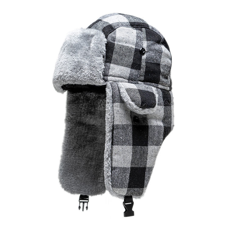 A red and white plaid hat with a holly leaf 54805713 PNG A red and white plaid hat with a holly leaf 54805713 PNG